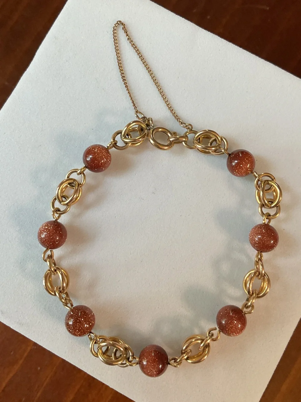 Goldstone and Gold Tone Chain Link Bracelet with Safety Chain Orange